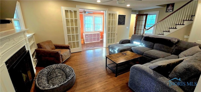 3329 Kirkwall Rd, Ottawa Hills, OH 43606 - living area with ceiling fan, wood finished floors, a fireplace, stairway, and recessed lighting
