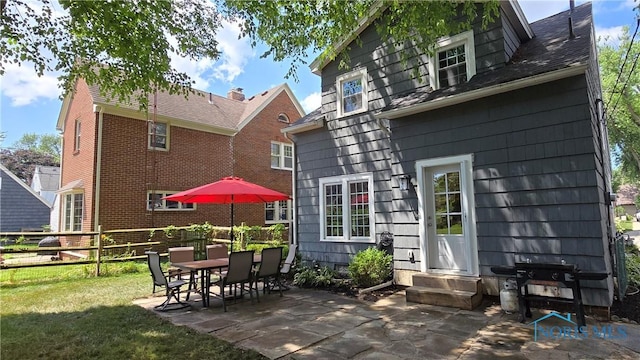 3329 Kirkwall Rd, Ottawa Hills, OH 43606 - rear view of property with entry steps and a patio