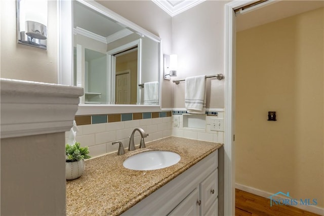 6768 Denbridge Dr, Sylvania, OH 43560 - bathroom with ornamental molding, decorative backsplash, and vanity