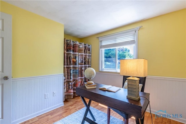 6768 Denbridge Dr, Sylvania, OH 43560 - home office with a wainscoted wall and wood finished floors