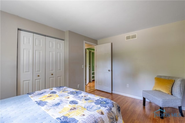6768 Denbridge Dr, Sylvania, OH 43560 - bedroom featuring a closet and wood finished floors
