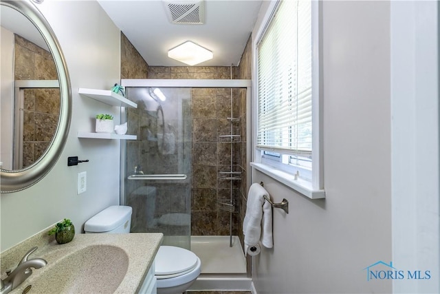6768 Denbridge Dr, Sylvania, OH 43560 - full bathroom featuring a stall shower and vanity