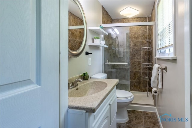 6768 Denbridge Dr, Sylvania, OH 43560 - bathroom with vanity, a shower stall, and tile patterned flooring