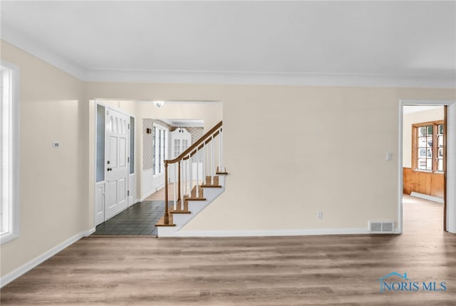 2310 Goddard Rd, Toledo, OH 43606 - foyer with wood finished floors and stairs