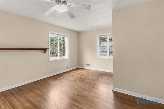 2310 Goddard Rd, Toledo, OH 43606 - spare room featuring wood finished floors and a ceiling fan