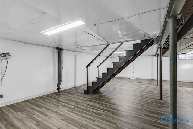 2310 Goddard Rd, Toledo, OH 43606 - finished basement with stairs and wood finished floors