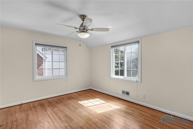 2310 Goddard Rd, Toledo, OH 43606 - spare room featuring wood finished floors and ceiling fan