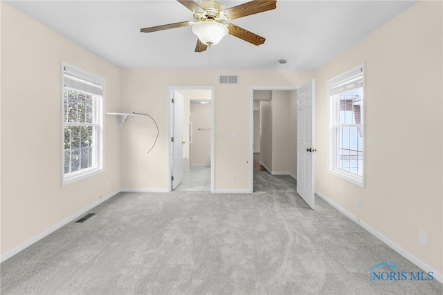 2310 Goddard Rd, Toledo, OH 43606 - unfurnished bedroom with carpet and a ceiling fan