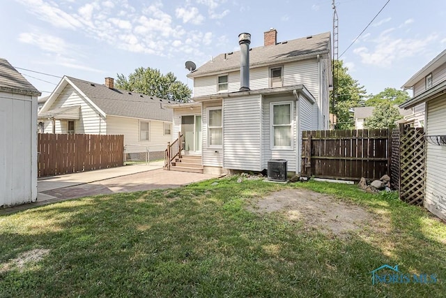 4334 Commonwealth Ave, Toledo, OH 43612 - rear view of property with entry steps and a patio