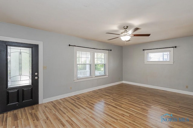 4334 Commonwealth Ave, Toledo, OH 43612 - foyer featuring healthy amount of natural light, light wood finished floors, and ceiling fan