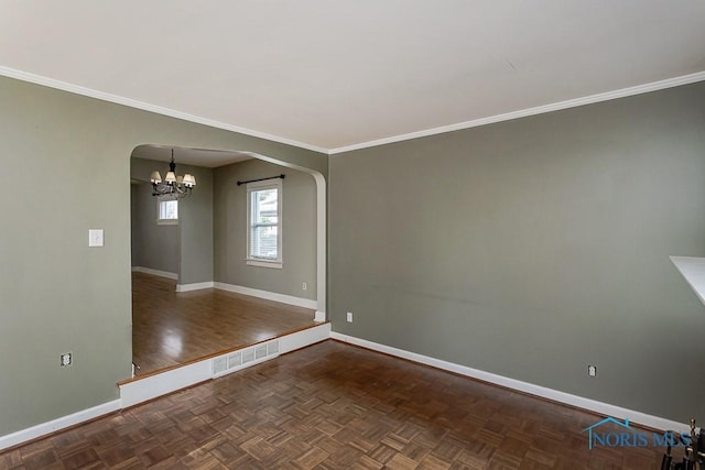 4334 Commonwealth Ave, Toledo, OH 43612 - spare room with arched walkways, a chandelier, and crown molding