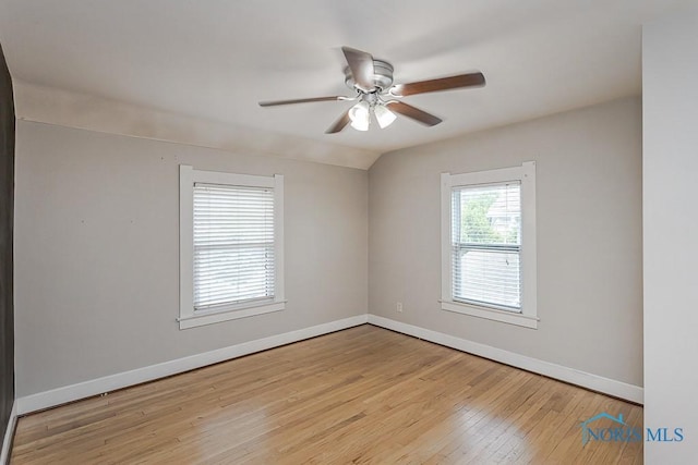 4334 Commonwealth Ave, Toledo, OH 43612 - spare room featuring hardwood / wood-style flooring, a ceiling fan, and lofted ceiling
