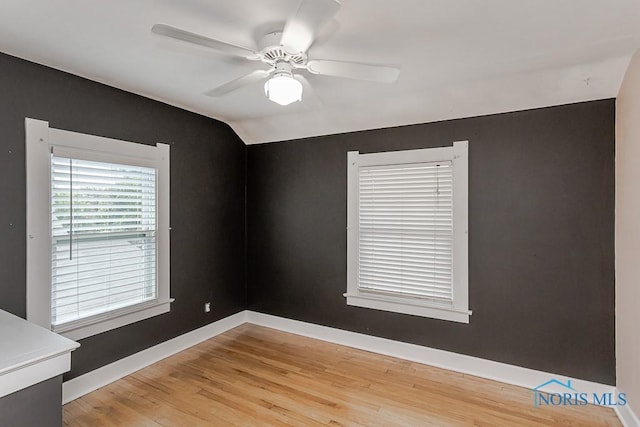 4334 Commonwealth Ave, Toledo, OH 43612 - unfurnished room featuring a ceiling fan, light wood-style flooring, and lofted ceiling