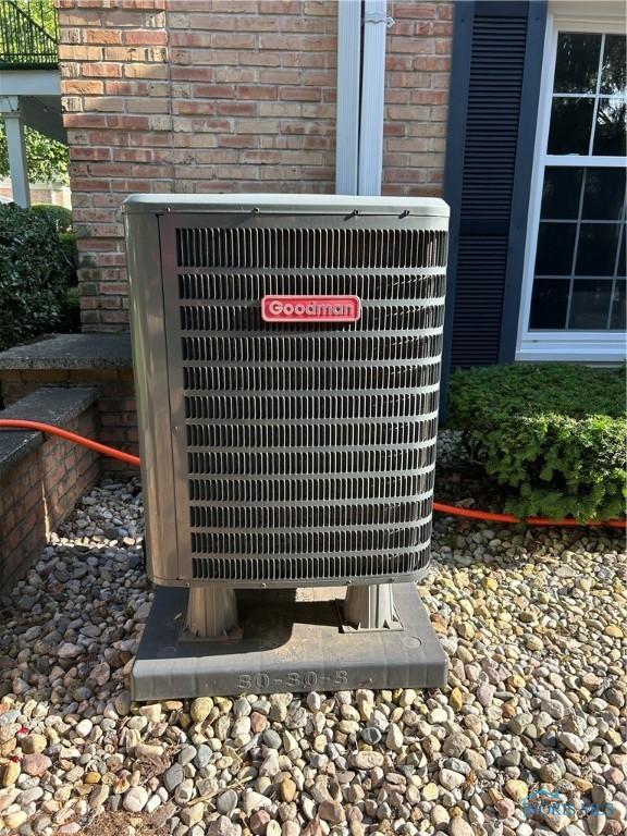 4243 W Bancroft St Unit 202W, Ottawa Hills, OH 43615 - exterior view of a cooling unit and brick siding