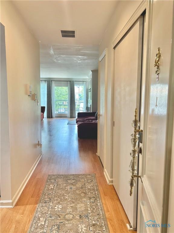 4243 W Bancroft St Unit 202W, Ottawa Hills, OH 43615 - hall with light wood-style flooring