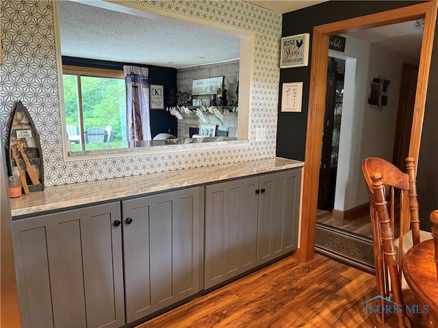 26654 Elliott Rd, Defiance, OH 43512 - kitchen with gray cabinetry, dark wood-type flooring, and light countertops