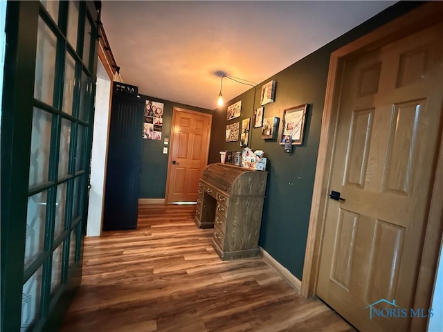 26654 Elliott Rd, Defiance, OH 43512 - hall featuring wood finished floors and baseboards