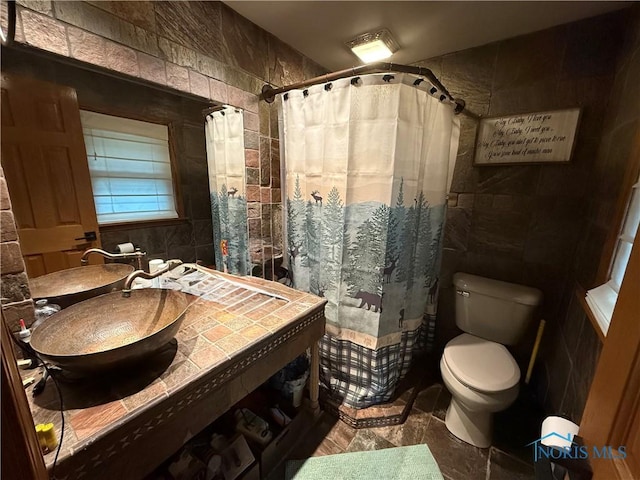 26654 Elliott Rd, Defiance, OH 43512 - bathroom featuring tile walls, vanity, and a shower with curtain