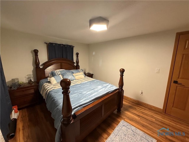 26654 Elliott Rd, Defiance, OH 43512 - bedroom with wood finished floors and baseboards