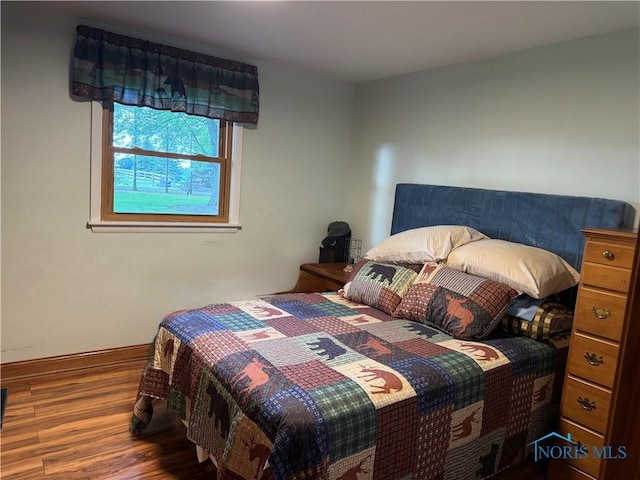 26654 Elliott Rd, Defiance, OH 43512 - bedroom featuring wood finished floors and baseboards