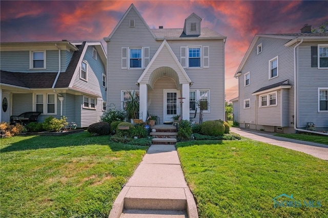 4526 Commonwealth Ave, Toledo, OH 43612 - view of front of home featuring a lawn