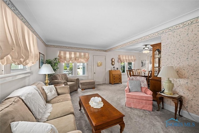 4526 Commonwealth Ave, Toledo, OH 43612 - carpeted living area with plenty of natural light, a ceiling fan, and ornamental molding