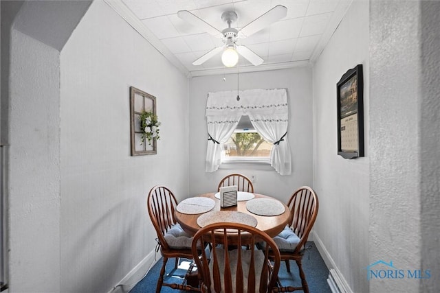 4526 Commonwealth Ave, Toledo, OH 43612 - carpeted dining space with ceiling fan and ornamental molding