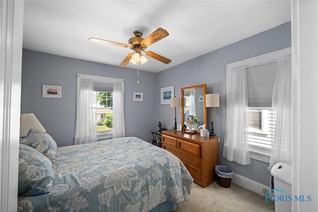 4526 Commonwealth Ave, Toledo, OH 43612 - bedroom with carpet floors and a ceiling fan