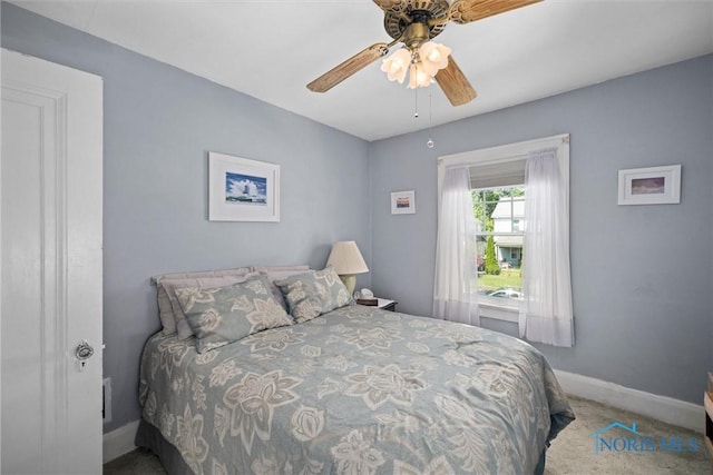 4526 Commonwealth Ave, Toledo, OH 43612 - carpeted bedroom featuring baseboards and ceiling fan