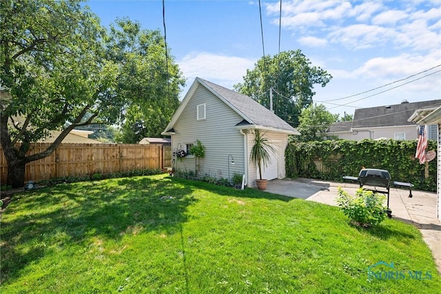 4526 Commonwealth Ave, Toledo, OH 43612 - view of side of home with a patio area and driveway