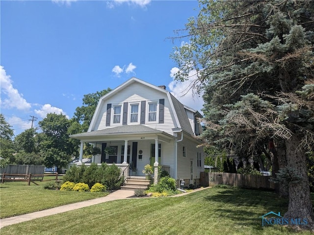 407 E Dudley St, Maumee, OH 43537 - colonial inspired home featuring a porch and a gambrel roof