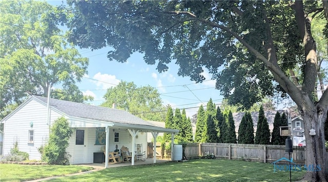 407 E Dudley St, Maumee, OH 43537 - fenced backyard featuring a patio area