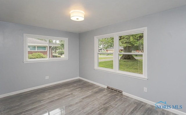 2617 Schroeder St, Toledo, OH 43613 - unfurnished room with baseboards and wood finished floors