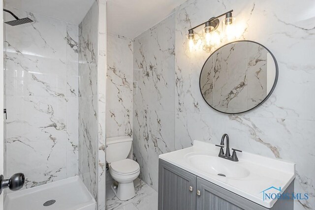 2617 Schroeder St, Toledo, OH 43613 - full bath with vanity, a marble finish shower, tile walls, and marble tiled floors