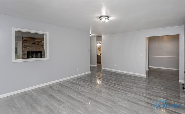 2617 Schroeder St, Toledo, OH 43613 - empty room with baseboards and wood finished floors