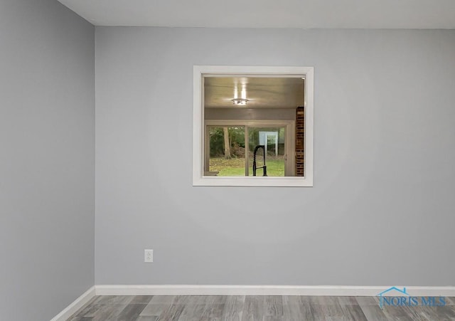 2617 Schroeder St, Toledo, OH 43613 - empty room with baseboards and wood finished floors