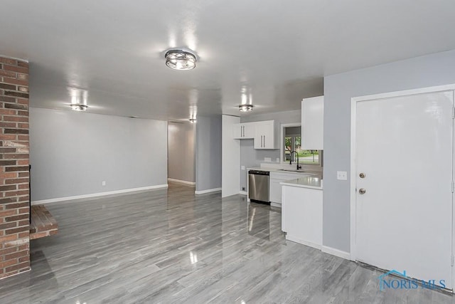 2617 Schroeder St, Toledo, OH 43613 - unfurnished living room featuring a sink and light wood finished floors