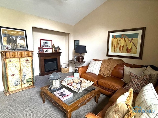 7361 Caracole Ct Unit 7361, Sylvania, OH 43560 - carpeted living area featuring lofted ceiling and a glass covered fireplace