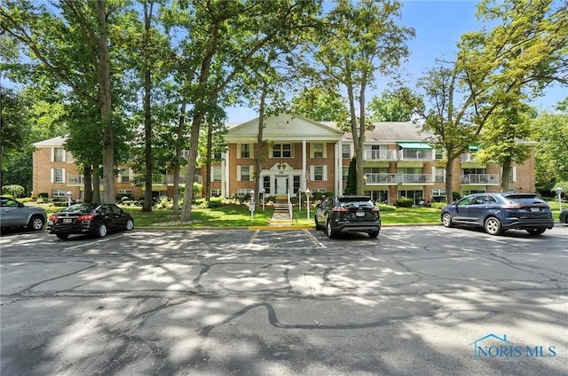 5679 Monroe St Unit 410, Sylvania, OH 43560 - view of property with uncovered parking