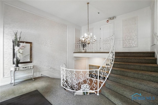 5679 Monroe St Unit 410, Sylvania, OH 43560 - stairs with carpet flooring and a chandelier