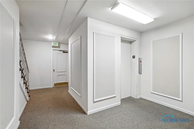 5679 Monroe St Unit 410, Sylvania, OH 43560 - hallway with carpet and elevator