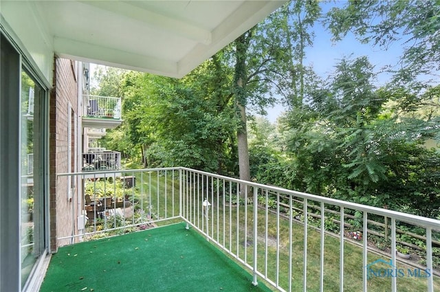 5679 Monroe St Unit 410, Sylvania, OH 43560 - balcony featuring view of scattered trees