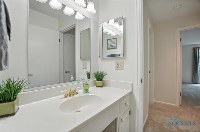 5679 Monroe St Unit 410, Sylvania, OH 43560 - bathroom with vanity and baseboards