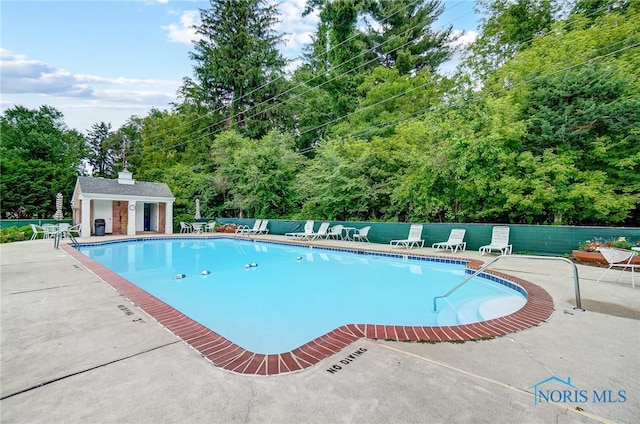 5679 Monroe St Unit 410, Sylvania, OH 43560 - community pool featuring a patio