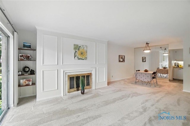 5679 Monroe St Unit 410, Sylvania, OH 43560 - living area featuring carpet and a glass covered fireplace