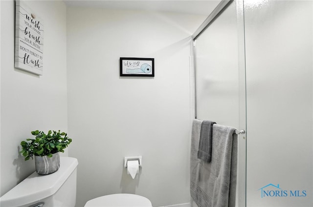 5679 Monroe St Unit 410, Sylvania, OH 43560 - bathroom featuring toilet and an enclosed shower