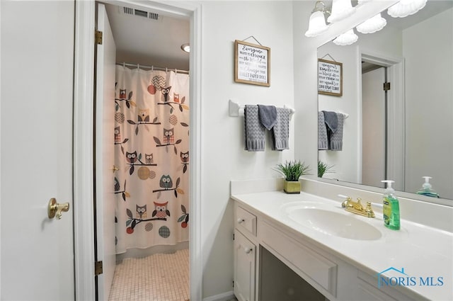 5679 Monroe St Unit 410, Sylvania, OH 43560 - bathroom featuring vanity, tile patterned floors, and a shower with shower curtain