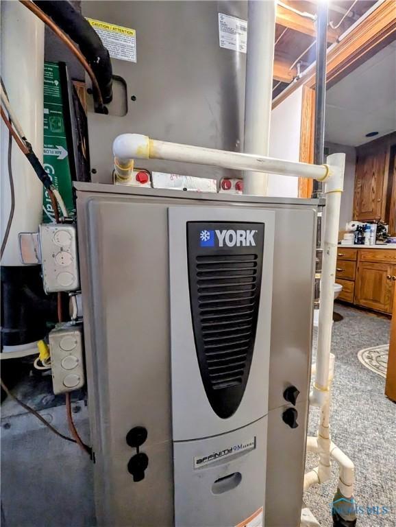 309 Buckeye St, Archbold, OH 43502 - utility room with heating unit