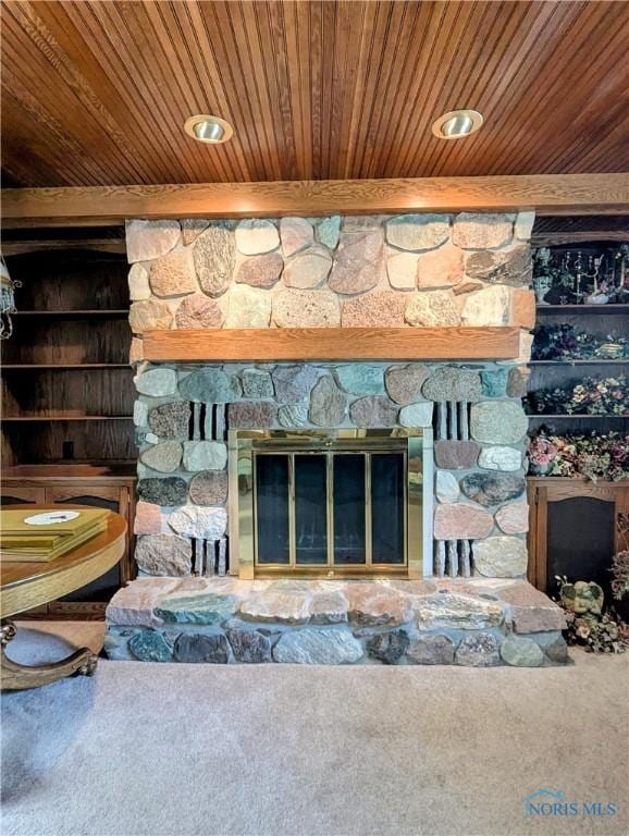 309 Buckeye St, Archbold, OH 43502 - detailed view of a stone fireplace, wood ceiling, and carpet floors