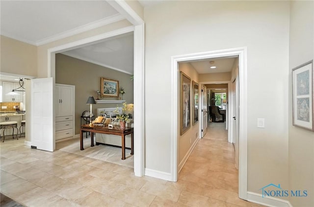 5576 N Citation Rd, Ottawa Hills, OH 43615 - corridor featuring crown molding and light tile patterned floors